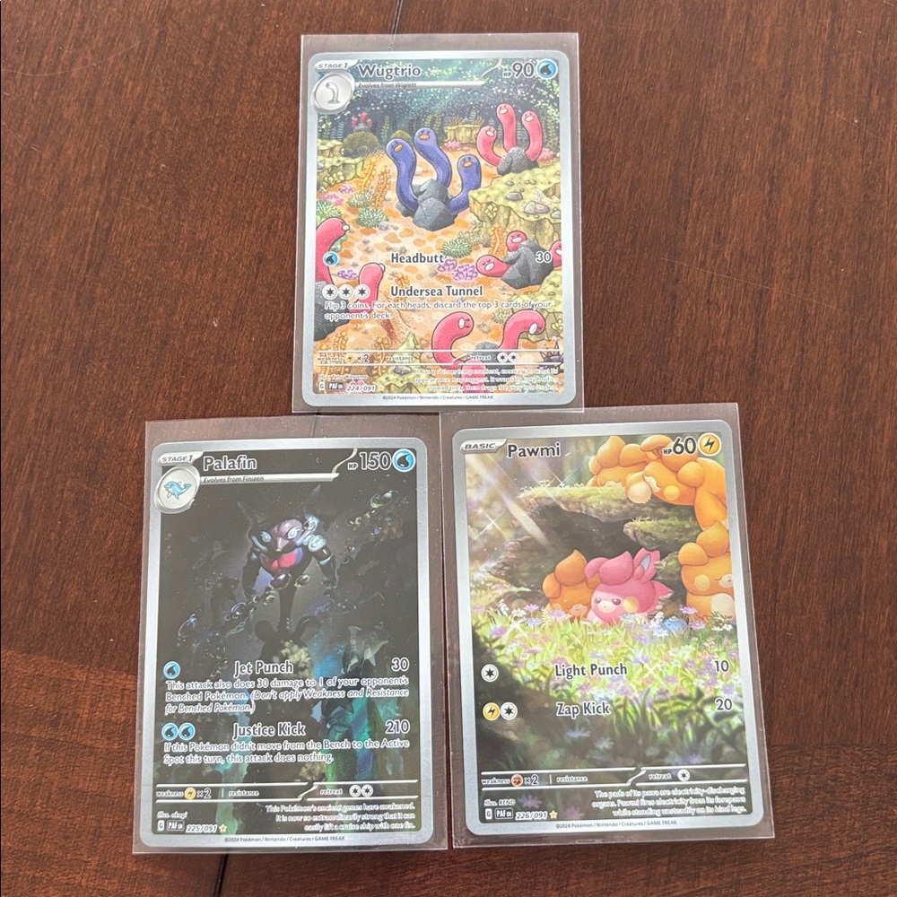 Pokémon Trading Cards Palafin, Wugtrio, Pawmi Illustration